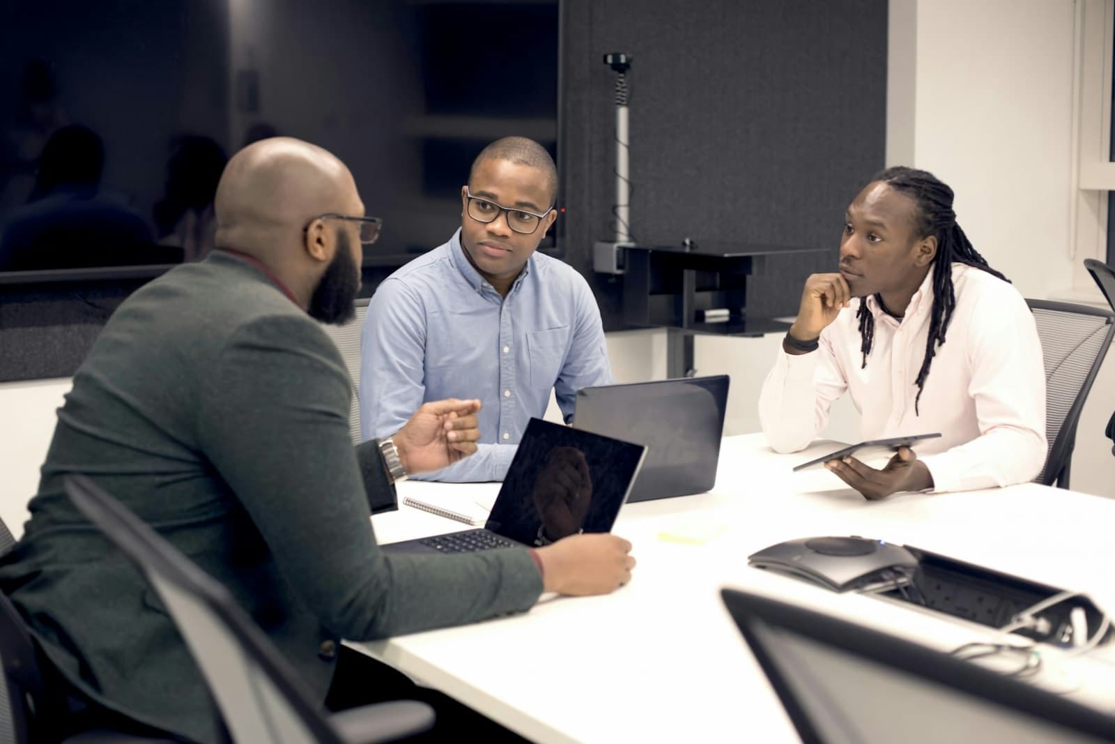 A care team meeting around a table